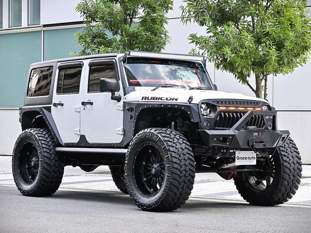 ジープ・ラングラーアンリミテッド ルビコン・ハードロック・フルカスタム・新品電動サイドステップ ・リフトUP・FUEL24in・金属製アーマーフェンダー・社外バンパー・社外グリル・LEDライト・マグナフロー2本出しマフラー・FOX足廻り・社外デフカバー・社外ロールケージ・LEDアンビエントライト(30枚目)