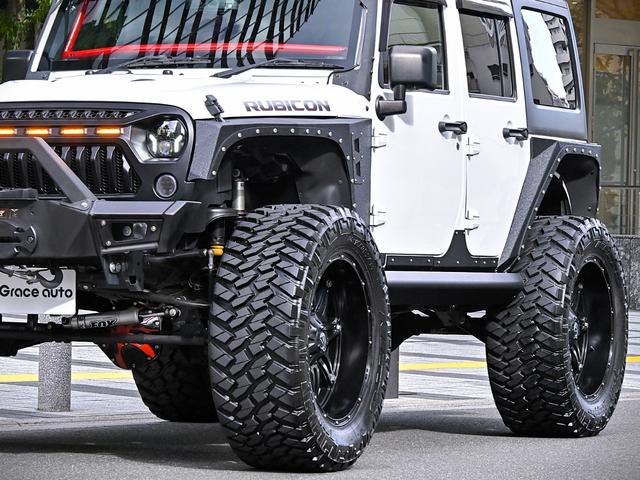 ジープ・ラングラーアンリミテッド ルビコン・ハードロック・フルカスタム・新品電動サイドステップ ・リフトUP・FUEL24in・金属製アーマーフェンダー・社外バンパー・社外グリル・LEDライト・マグナフロー2本出しマフラー・FOX足廻り・社外デフカバー・社外ロールケージ・LEDアンビエントライト(50枚目)