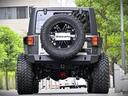 ルビコン・ハードロック・フルカスタム・新品電動サイドステップ ・リフトUP・FUEL24in・金属製アーマーフェンダー・社外バンパー・社外グリル・LEDライト・マグナフロー2本出しマフラー・FOX足廻り・社外デフカバー・社外ロールケージ・LEDアンビエントライト(24枚目)