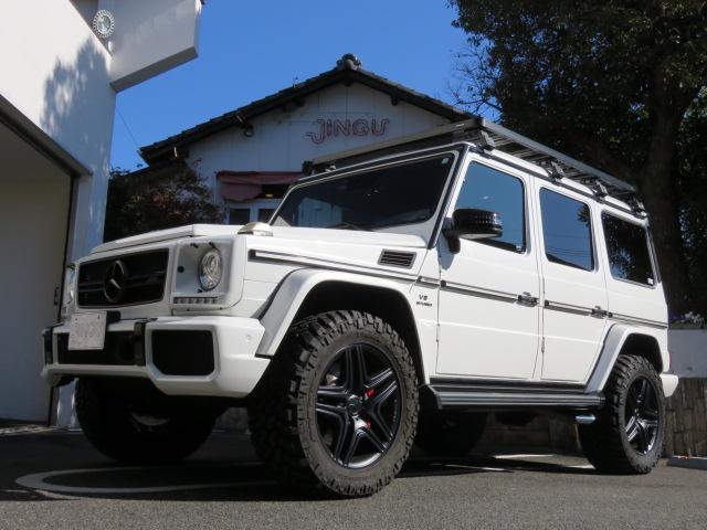 Ｇクラス Ｇ６３　ＡＭＧ　ディーラー車　左ハンドル　レザーシート　シートヒーター　ベンチレーター　ブラインドスポット　レーダーセフティ　背面タイヤレス　ルーフラック　ラダー　純正ナビ　バックカメラ（1枚目）