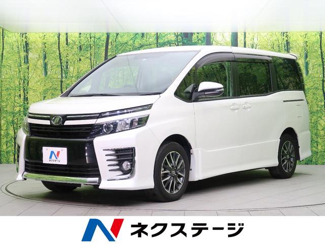 ZS 純正9型SDナビ 禁煙車 LEDヘッドライト 両側電動ドア バックカメラ ETC 純正16AW アイドリングストップ 7人乗り オートエアコン オートライト コーナーセンサー デュアルエアコン(1枚目)