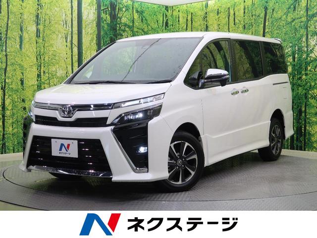 ヴォクシー トヨタ ｚｓ 煌ｉｉｉ 登録済未使用車 ４ｗｄ 現行型 特別仕様車 セーフティセンス 両側パワースライドドア ハーフレザーシート クルーズコントロール ｌｅｄヘッド ｌｅｄフォグ スマートキー 純正エアロ 純正アルミ 滋賀県 ｚｓ 煌ｉｉｉ 登録済未使用車