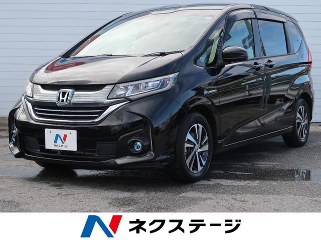 ホンダ フリードハイブリッドハイブリッド ｇホンダセンシング ｓｄナビ 両側電動スライドドア ６人乗り ホンダセンシング ｌｅｄヘッドライト バックカメラ スマートキー 電動格納ミラー ドアバイザーの中古車 17 平成29 年式 走行5 7万キロ 車体色クリスタル