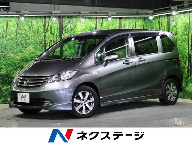 フリード ホンダ ｇ エアロ イクリプスナビ バックカメラ ｅｔｃ パワースライドドア オートエアコン ｈｉｄヘッドライト オートライト 純正１５インチａｗ ３列シート ６人乗り 大阪府 ｇ エアロ イクリプスナビ バックカメラ ｅｔｃ パワースライドドア オート