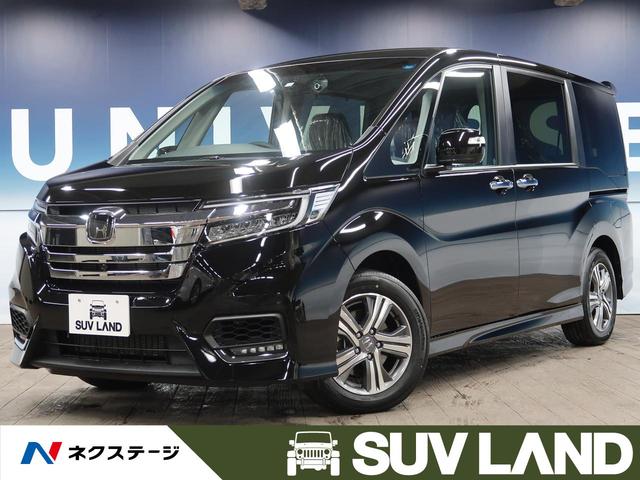ステップワゴンスパーダ ホンダ ｅ ｈｅｖスパーダ ｇ ホンダセンシング 登録済未使用車 １０型ナビ 全周囲カメラ 両側電動スライド アダプティブクルコン ｅｔｃ２ ０ ｌｅｄヘッドライト ｌｅｄフォグ 純正１６ａｗ プッシュスタート 車線逸脱警報 デュアルオート