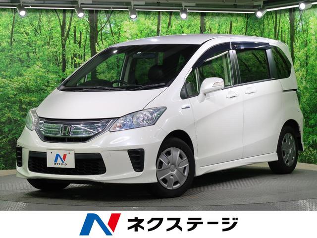 ホンダ フリードハイブリッドジャストセレクション 純正ナビ バックカメラ 両側電動スライドドア クルーズコントロール ７人乗り 禁煙車 ｈｉｄヘッドライト 純正ｅｔｃ オートエアコン オートライトの中古車 車体価格99 9万円 14 平成26 年式 走行6 9万キロ 車体色