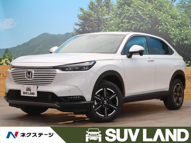 e:HEV X 登録済未使用車 ホンダセンシング 衝突軽減ブレーキ レーダークルーズ 踏み間違え防止装置 レーンキープアシスト LEDヘッド オートハイビーム コーナーセンサー 純正16AW ステアリングスイッチ(1枚目)