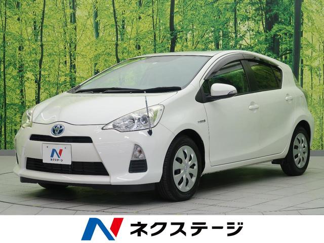 G ハイブリッド 禁煙車 純正ナビ バックカメラ シートヒーター スマートキー オートライト オートエアコン 革巻きステアリング CD再生 地デジ プライバシーガラス 電動格納ミラー アイドリングストップ(1枚目)
