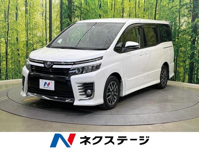 ZS 両側パワスラ 禁煙 SDナビ 10型後席モニター 7人 フルセグ バックカメラ Bluetooth ビルトインETC 純正アルミ LEDヘッド スマートキー デュアルエアコン 電動格納ドアミラー(1枚目)