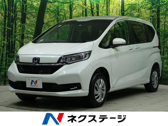 G 登録済未使用車 4WD 禁煙車 7人乗り ホンダセンシング 両側パワースライドドア 衝突軽減 レーダークルーズコントロール 寒冷地仕様 シートヒーター ロールサンシェード USB端子 スマートキー(1枚目)