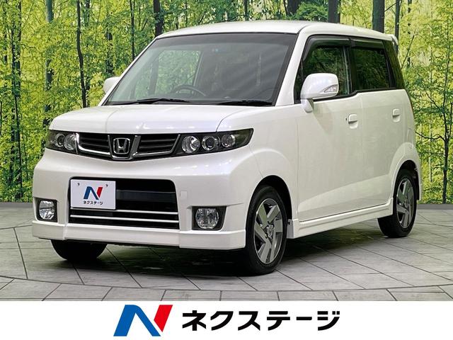 W 禁煙車 ナビゲーション スマートキー オートエアコン HIDヘッドライト 14インチ純正アルミホイール 衝突安全ボディ 盗難防止システム プライバシーガラス ドアバイザー フォグライト パワステ(1枚目)