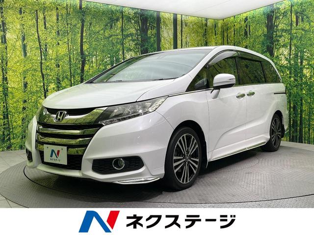 アブソルート 7人乗り メーカー純正ナビ 後席モニター 両側電動ドア CTBA LEDヘッド ETC ハーフレザーシート 純正18アルミ クルコン リアオートエアコン スマートキー フォグ 革巻きステアリング(1枚目)
