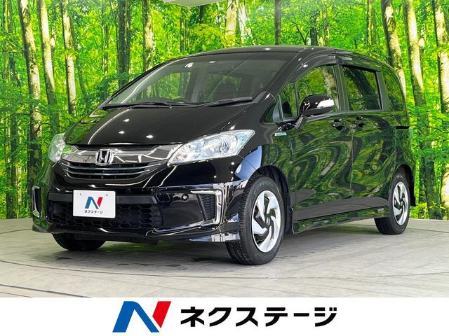ハイブリッド プレミアムエディション 特別仕様車 禁煙車 純正ナビ 両側電動ドア クルコン HIDヘッド バックカメラ Bluetooth接続 ETC クリアランスソナー オートエアコン オートライト(1枚目)