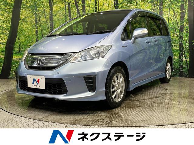 ジャストセレクション 禁煙車 両側電動スライドドア 純正ナビ バックカメラ ドライブレコーダー クルーズコントロール HIDヘッドライト 革巻きステアリング ハーフレザーシート スマートキー オートエアコン オートライト(1枚目)