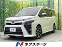 ヴォクシー ＺＳ　煌　後期　純正１０型ナビ　セーフティセンス　両側電動ドア　禁煙車　バックカメラ　クルーズコントロール　ＬＥＤヘッド＆フォグ　リアオートエアコン　７人乗り　ドラレコ　ＥＴＣ　Ｂｌｕｅｔｏｏｔｈ接続（1枚目）