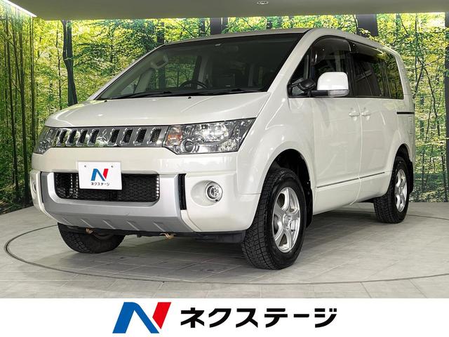 G パワーパッケージ 4WD HDDナビ 後席モニター 両側電動ドア 禁煙車 バックカメラ Bluetooth クルコン HIDヘッドライト ETC フルセグ オートエアコン プッシュスタート オートライト 盗難防止装置(1枚目)
