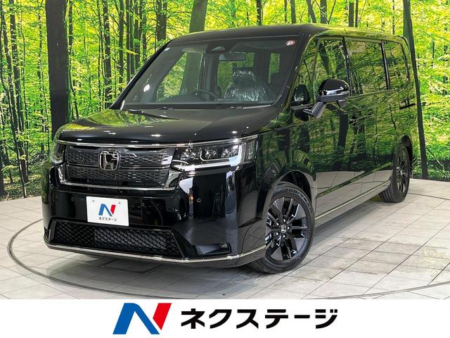 ホンダ ステップワゴン スパーダ　登録済未使用車　衝突軽減／車線逸脱警報　レーダークルーズ　両側電動スライドドア　シートヒーター　パワーバックドア　ＬＥＤヘッド／オートライト　ダブルエアコン　アイドリングストップ　雹害車