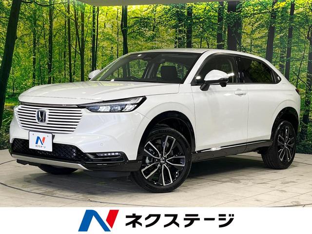 e:HEV Z 登録済未使用車 ホンダセンシング アダプティブクルーズコントロール LEDヘッド シーケンシャルターンランプ 革巻きステアリング ステアリングヒーター ハンズフリーパワーバックドア 前席シートヒーター(1枚目)