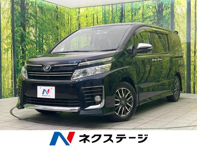 トヨタ ヴォクシー ＺＳ　煌　純正９型ナビ　両側電動スライドドア　禁煙車　バックカメラ　ＬＥＤヘッドライト　７人乗り　Ｂｌｕｅｔｏｏｔｈ再生　ＥＴＣ　スマートキー　デュアルエアコン　オートライト　純正１６インチＡＷ