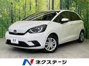 フィット ホーム　ホンダセンシング　禁煙車　ＳＤナビ　レーダークルーズ　バックカメラ　Ｂｌｕｅｔｏｏｔｈ再生　レーンキープアシスト　コーナーセンサー　スマートキー　オートライト　オートエアコン　ステアリングスイッチ（1枚目）