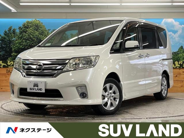 日産 セレナ ハイウェイスター　Ｊパッケージ　フリップダウンモニター　両側電動スライドドア　禁煙車　ＨＤＤナビ　ＨＩＤヘッドライト　クルーズコントロール　リアオートエアコン　ＥＴＣ　スマートキー　フォグライト　純正１６インチアルミホイール