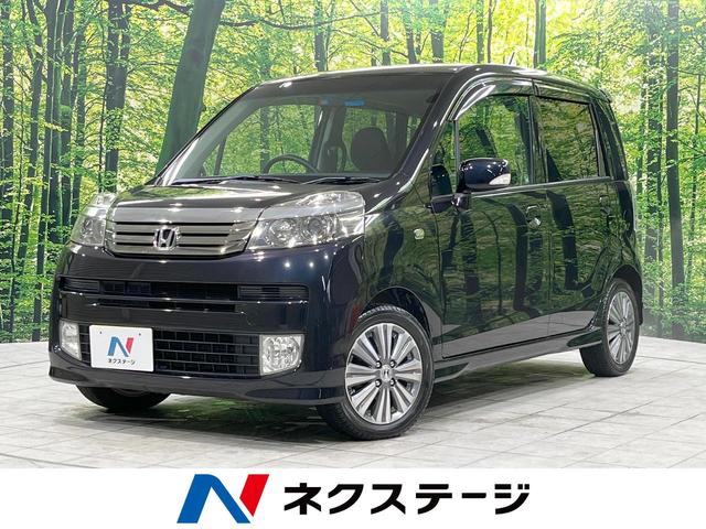 ホンダ ライフ ディーバスマートスタイル　禁煙車　寒冷地仕様　バックカメラ　ＨＩＤヘッドライト　オートエアコン　純正１４インチアルミホイール　フォグライト　ＣＤ再生　盗難防止装置　プライバシーガラス　ベンチシート　シートリフター　アームレスト