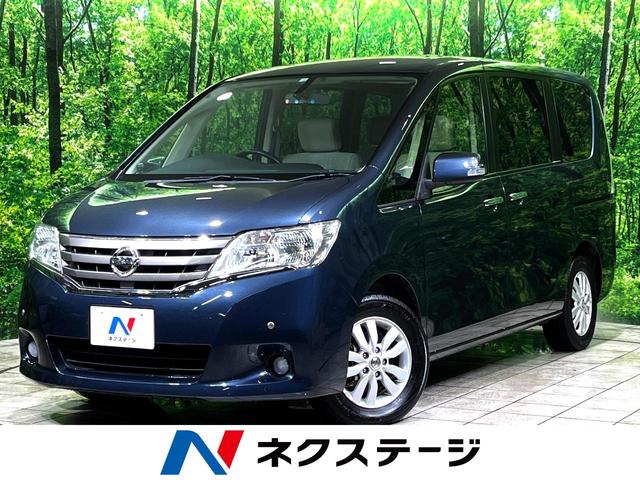 日産 セレナ ２０Ｇ　純正ＳＤナビ　フリップダウンモニター　バックカメラ　禁煙車　両側電動ドア　オートエアコン　オートライト　純正１５ＡＷ　純正革巻きステアリング　スマートキー　電動格納ミラー