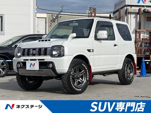 沖縄県の中古車ならジムニー ランドベンチャー　４ＷＤ　５ＭＴ　禁煙車　ディスプレイオーディオ　シートヒーター　合皮シート　純正１６インチアルミホイール　革巻きステアリング　電動格納ミラー　キーレス