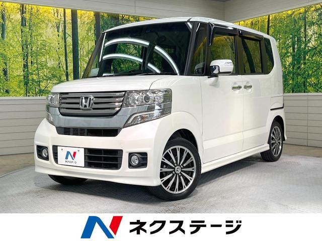 ホンダ Ｎ－ＢＯＸカスタム Ｇ・ターボＡパッケージ　両側電動スライドドア　衝突軽減ブレーキ　禁煙車　純正ナビ　バックカメラ　Ｂｌｕｅｔｏｏｔｈ再生　ＥＴＣ　ＨＩＤヘッドライト　スマートキー　クルコン　オートライト　オートエアコン　革巻きステアリング