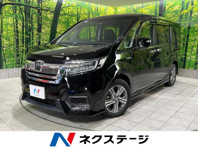 ステップワゴンスパーダ スパーダハイブリッド　Ｇ・ＥＸ　ホンダセンシング　ＢＩＧ－Ｘ１０型ナビ　バックカメラ　アダプティブクルーズ　衝突軽減装置　両側電動ドア　前席シートヒーター　リアオートエアコン　革巻ハンドル　ＬＥＤヘッド　ロールサンシェード　スマートキー（1枚目）