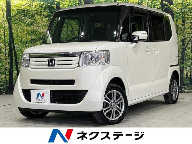 ホンダ Ｎ－ＢＯＸ Ｇ・ターボＬパッケージ　４ＷＤ　禁煙車　ＳＤナビ　両側電動スライド　バックカメラ　Ｂｌｕｅｔｏｏｔｈ　ＥＴＣ　ドラレコ　ＨＩＤヘッド　オートライト　オートエアコン　クルコン　純正１４インチアルミ　革巻きステアリング