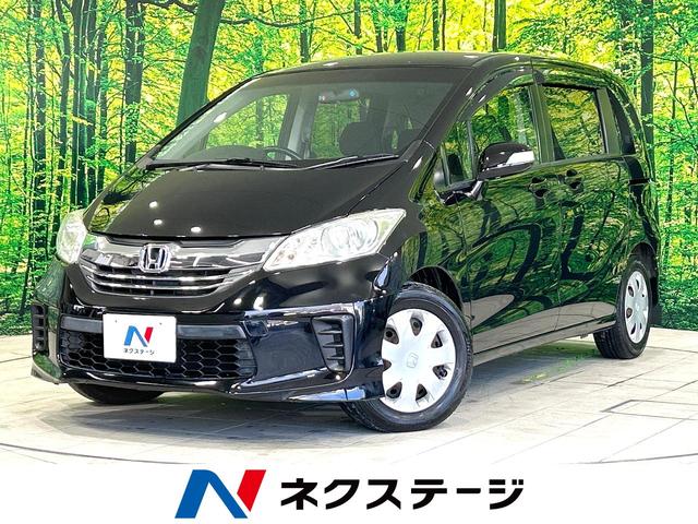 フリード(ホンダ) Ｇ　ジャストセレクション　禁煙車　電動スライドドア　純正ナビ　バックカメラ　Ｂｌｕｅｔｏｏｔｈ再生 中古車画像