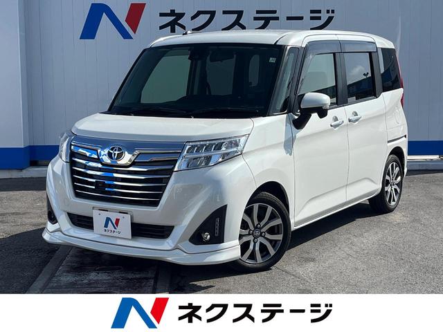 沖縄県の中古車ならルーミー カスタムＧ－Ｔ　禁煙車　純正ＳＤナビ　バックカメラ　両側パワースライドドア　セーフティセンス　シートヒーター　スマートキー　ＬＥＤヘッドライト　純正１５インチアルミホイール　アイドリングストップ