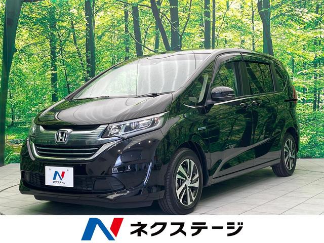 ハイブリッド・ＥＸ　純正９型ナビ　フリップダウン　Ｓパッケージ　バックカメラ　両側電動ドア　ホンダセンシング　アダプティブクルーズ　ＬＥＤヘッド　オートライト　コーナリングライト　ＥＴＣ　シートヒーター　半革シート(1枚目)