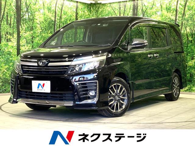 トヨタ ヴォクシー ＺＳ　煌ＩＩ　禁煙車　１１型ＢＩＧ－Ｘ　フリップダウンモニター　両側パワスラ　トヨタセーフティセンス　ＬＥＤヘッドライト　オートライト　オートエアコン　純正１６インチアルミ　ＥＴＣ　バックカメラ　スマートキー