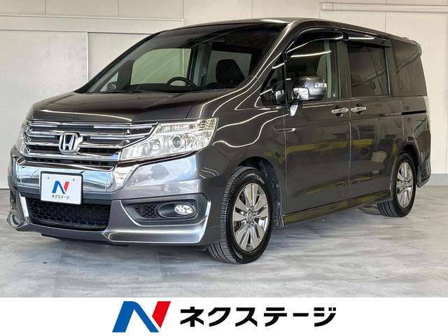 沖縄県の中古車ならステップワゴンスパーダ Ｚ　両側電動スライドドア　アルパイン８インチナビ　バックカメラ　Ｂｌｕｅｔｏｏｔｈ再生　フルセグＴＶ　ＥＴＣ　ＨＩＤヘッドライト　スマートキー　８人乗り　革巻きステアリング　純正１６インチホイール