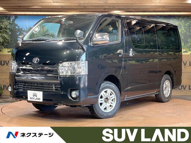 トヨタ ハイエースバン スーパーＧＬ　ダークプライム　４ＷＤ　純正ナビ　フリップダウンモニター　バックモニター　１００Ｖ電源　オートライト　オートエアコン　スマートキー　ハーフレザーシート　ウッドコンビステアリング　ステアリングスイッチ