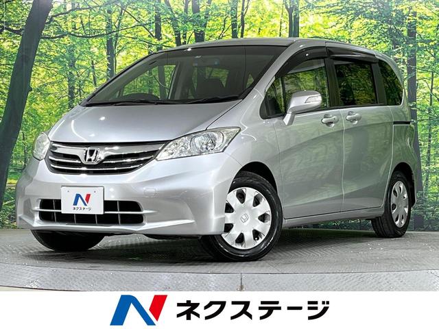 フリード(ホンダ) Ｇ　ジャストセレクション　禁煙車　７人乗り　ＳＤナビ　ワンセグ　ＣＤ 中古車画像