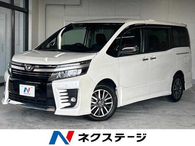 ヴォクシー ＺＳ　煌ＩＩ　禁煙車　フリップダウンモニター　両側電動スライドドア　トヨタセーフティ　純正ＳＤナビ　バックカメラ　フルセグＴＶ　スマートキー　ＬＥＤヘッドライト　オートライト　ＥＴＣ　プライバシーガラス