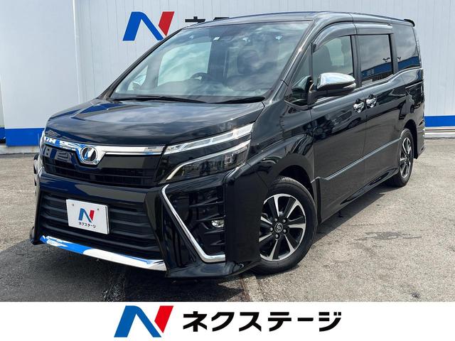 沖縄県の中古車ならヴォクシー ＺＳ　煌　禁煙車　純正９型ナビ　Ｂｌｕｅｔｏｏｔｈ接続　衝突被害軽減装置　両側電動スライドドア　クルーズコントロール　バックカメラ　ＬＥＤヘッドライト　車線逸脱警報　フルセグＴＶ　純正１６ＡＷ　ＥＴＣ