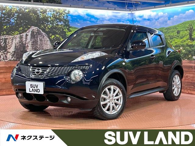 日産 ジューク １５ＲＸ　タイプＶ　禁煙車　純正ナビ　ＥＴＣ　スマートキー　オートライト　革巻きステアリング　ＣＤ再生　プライバシーガラス　ＴＶ　純正１６インチアルミホイール　オートエアコン　フロントフォグランプ