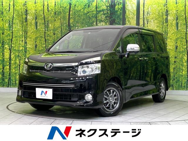 トヨタ ヴォクシー ＺＳ　煌　禁煙車　ＳＤナビ　両側パワースライド　バックカメラ　Ｂｌｕｅｔｏｏｔｈ再生　フルセグＴＶ　ＥＴＣ　ＨＩＤヘッドライト　スマートキー　革巻きステアリング　パドルシフト　フォグライト　ＤＶＤ再生　ＣＤ再生