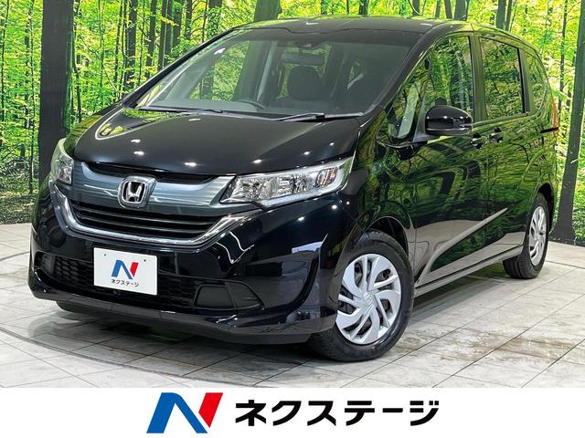 ホンダ フリード Ｇ・ホンダセンシング　禁煙　純正ナビ　後席モニタ　両側電動　バックカメラ　ＥＴＣ　クルーズコントロール　スマートキ　オートエアコン　アイドリングストップ　電動格納ミラ　車線逸脱警報　プライバシーガラス　雹害車