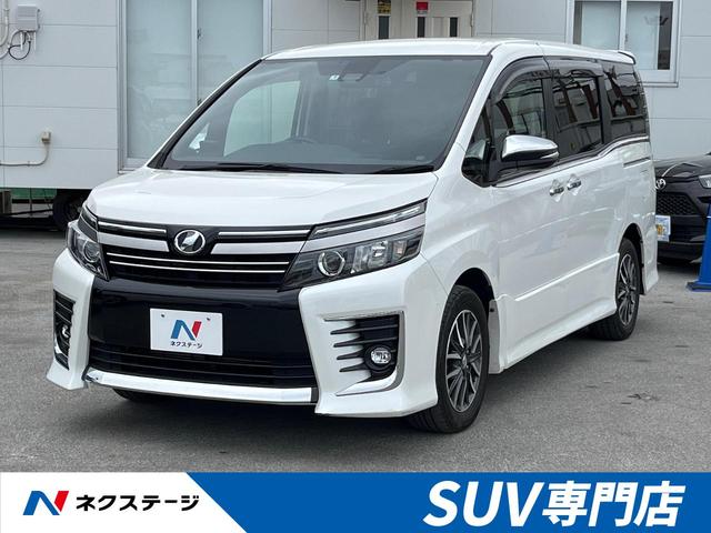 沖縄県豊見城市の中古車ならヴォクシー ＺＳ　煌ＩＩ　純正１０インチナビ　バックカメラ　禁煙車　両側パワスラ　セーフティセンス　車線逸脱警報　フルセグ　ＥＴＣ　Ｂｌｕｅｔｏｏｔｈ再生　ＬＥＤヘッドライト　純正１６インチアルミホイール