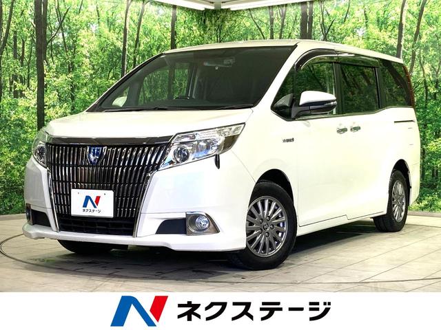 トヨタ エスクァイア ハイブリッドＧｉ　禁煙車　純正９型ＳＤナビ　両側パワスラ　クルーズコントロール　置くだけ充電　ＬＥＤヘッドライト　オートライト　オートエアコン　レザー調シート　シートヒーター　ＥＴＣ　バックカメラ　スマートキー