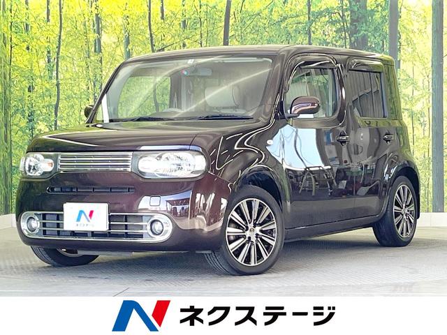 日産 キューブ アクシス　純正ナビ　禁煙車　フルセグ　ベージュ革シート　オートエアコン　ＨＩＤヘッド　スマートキー＆プッシュスタート　アイドリングストップ　電動格納ミラー　ＯＰ純正１６インチアルミ　アームレスト