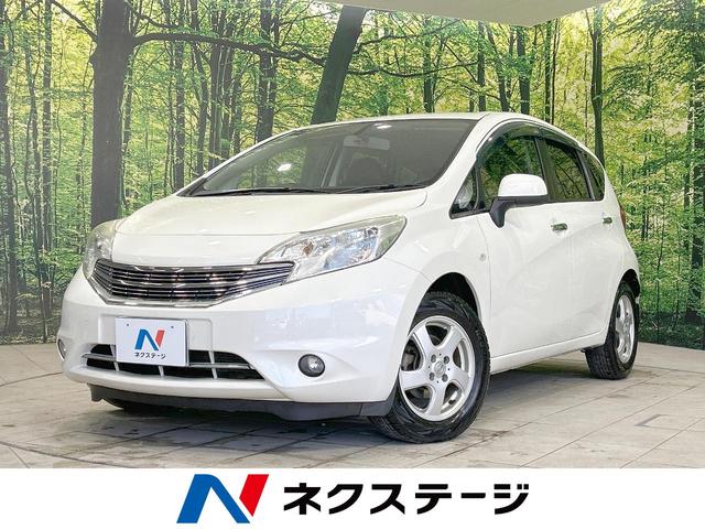 日産 ノート アクシス　禁煙車　純正ＳＤナビ　バックカメラ　Ｂｌｕｅｔｏｏｔｈ再生　フルセグＴＶ　スマートキー　ＥＴＣ　アイドリングストップ　電動格納ミラー　オートライト　オートエアコン　衝突安全ボディー　盗難防止装置