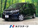 ハイブリッド・Ｇホンダセンシング　禁煙車　純正９型ナビ　フリップダウンモニター　両側電動スライドドア　バックカメラ　Ｂｌｕｅｔｏｏｔｈ再生　フルセグ　ＬＥＤヘッドライト　６人乗り　オートエアコン　スマートキー(1枚目)