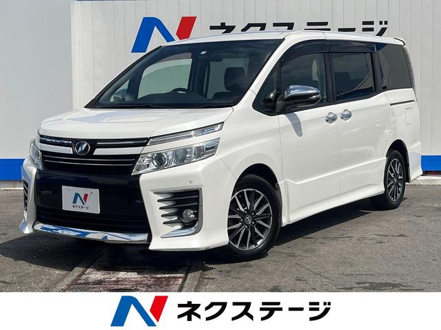 沖縄県の中古車ならヴォクシー ＺＳ　煌　禁煙車　純正ＳＤナビ　バックカメラ　両側パワースライドドア　アイドリングストップ　オートエアコン　ＥＴＣ　ＬＥＤヘッドライト　純正１６インチアルミホイール　スマートキー