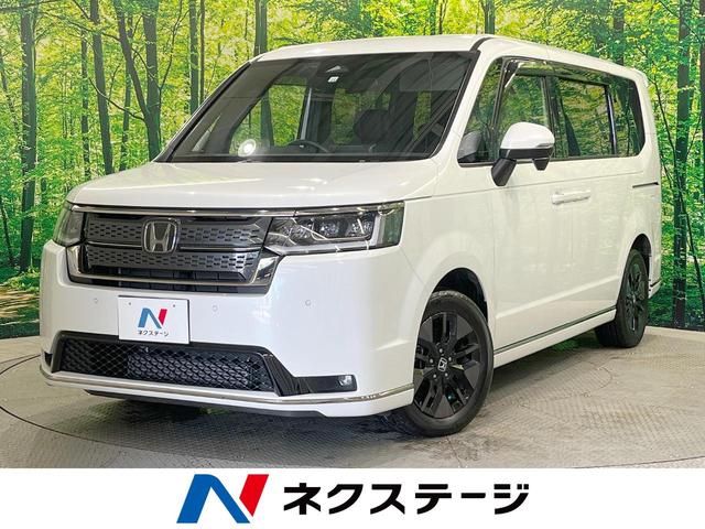 ホンダ ステップワゴン スパーダ　４ＷＤ　ＳＤナビ　バックカメラ　フリップダウンモニター　寒冷地仕様　ホンダセンシング　両側パワースライド　アダプティブクルーズコントロール　シートヒーター　ＥＴＣ　ブラインドスポットモニター